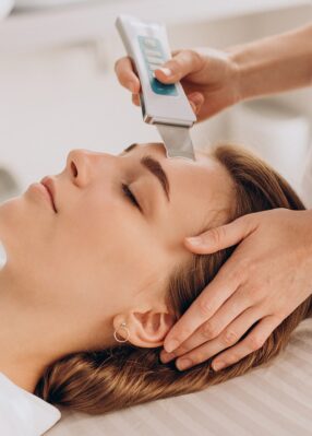 woman-having-beauty-treatment-procedures-salon