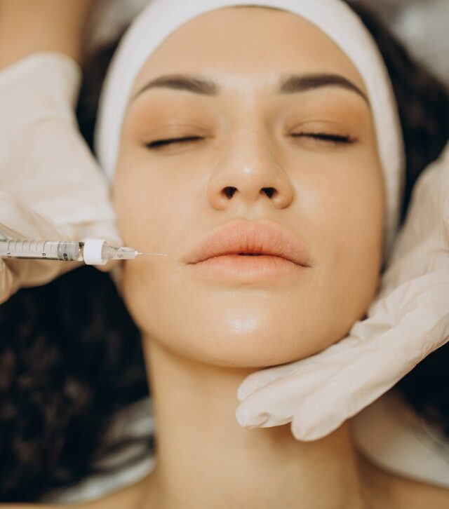 woman-making-injections-cosmetologist